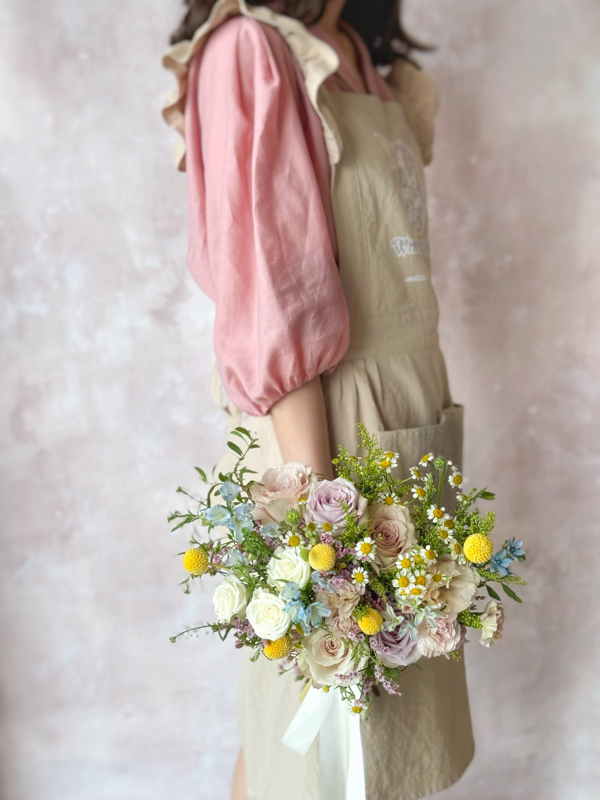 Dorothea fresh flowers bridal bouquet grand size, a lush pastel rose bouquet held by a bride, perfect for a romantic and dreamy wedding aesthetic