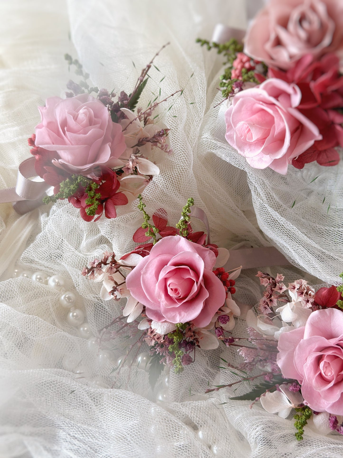 Close up view of Mei Hwa preserved rose boutonniere