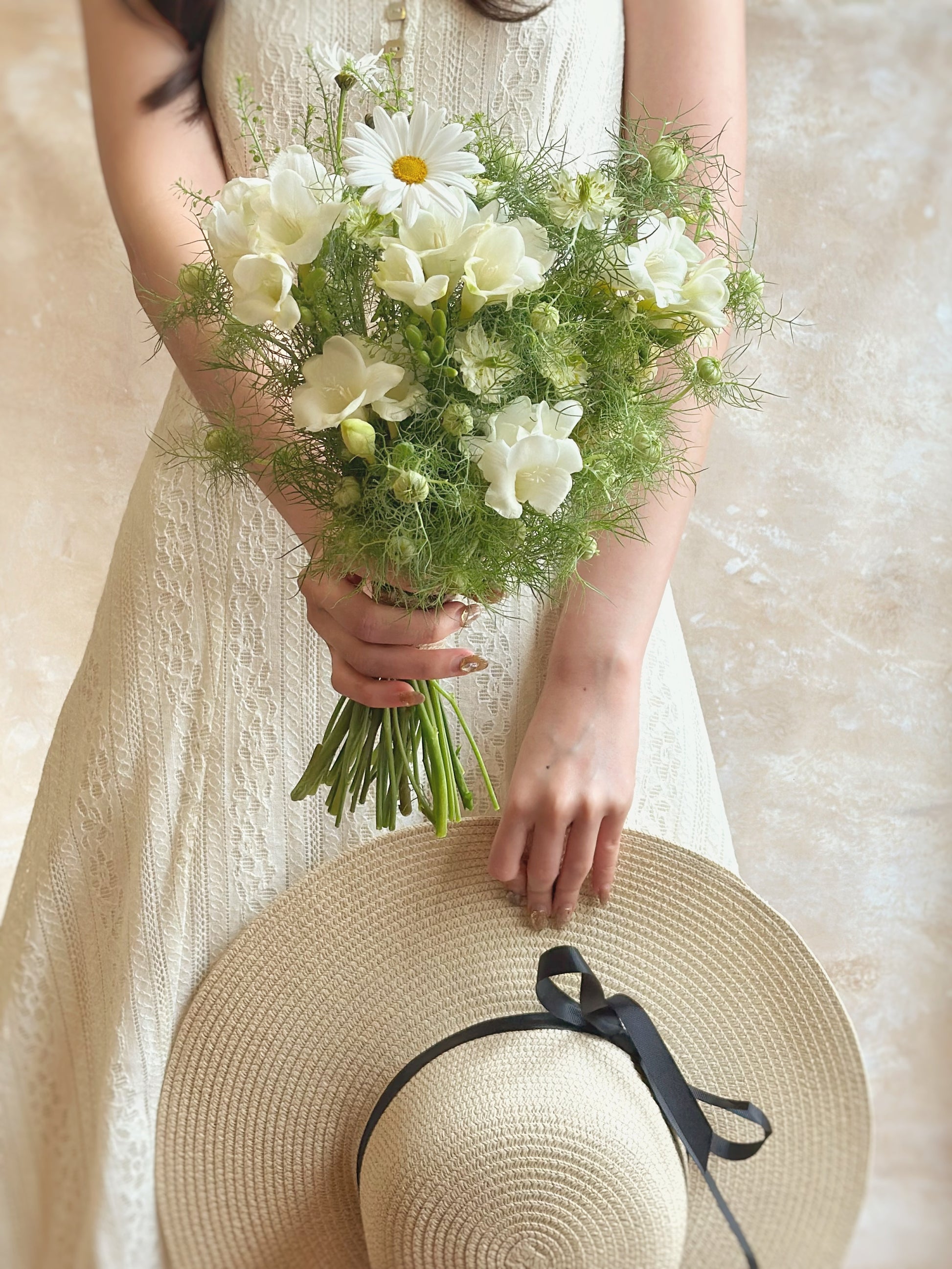 Close up view of misty forest bridal bouquet. The natural textures and soft colors create a fairy-like garden aesthetic, perfect for weddings or photoshoots.