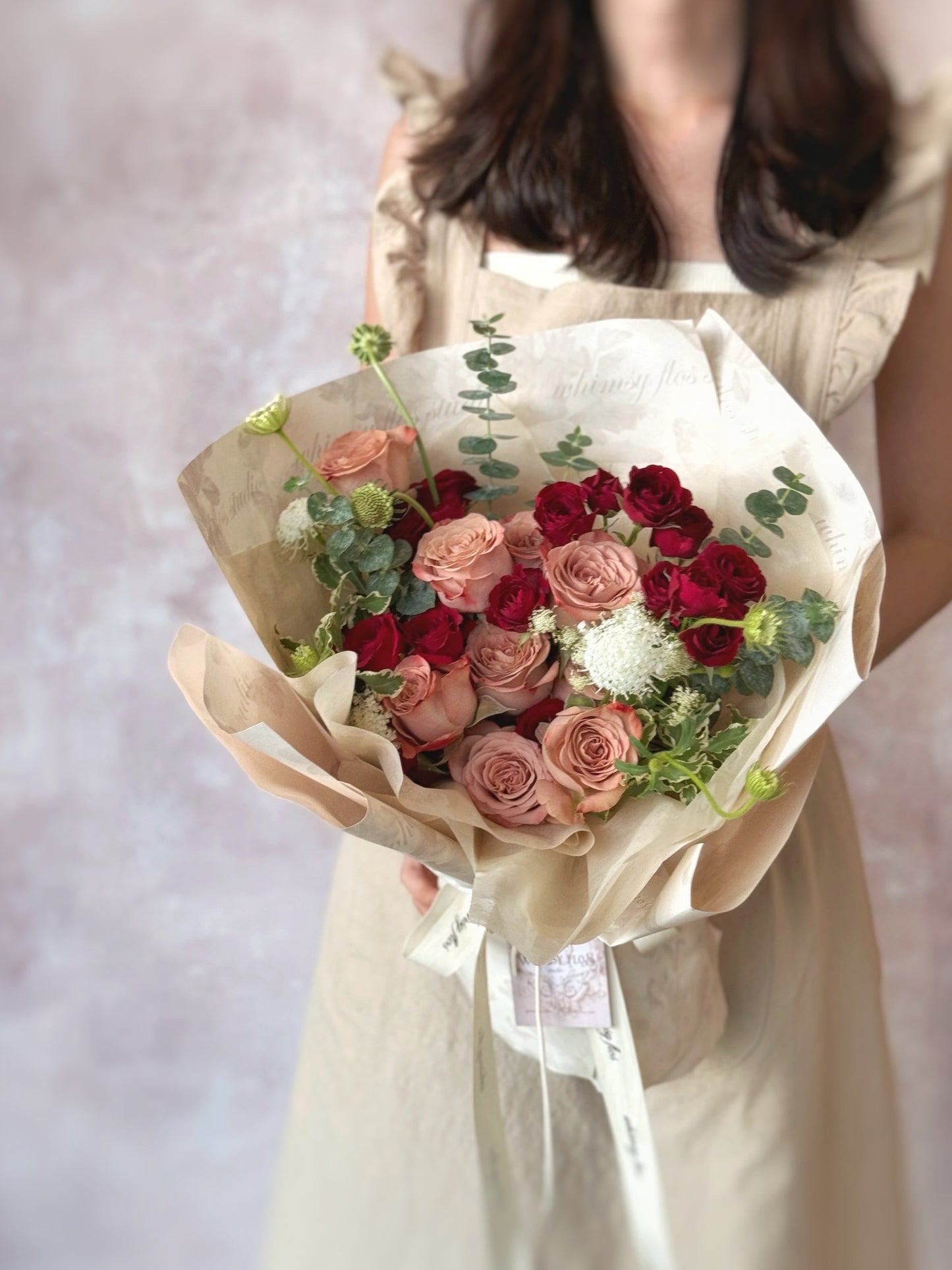Cappuccino rose red spray roses handtied bouquet grand size front view