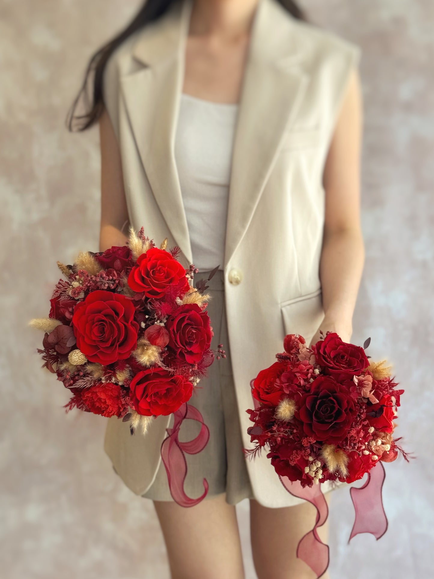 side by side view of Sienna round shaped preserved flowers bridal bouquet in luxe and grand size