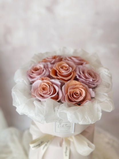 Anya preserved roses bouquet pink/peach color close up view