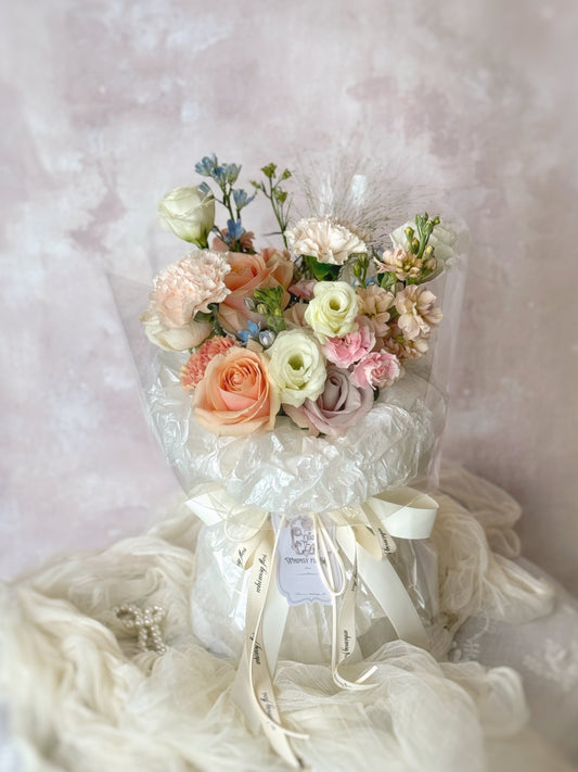 Colette_fresh_flowers_fluffy_cloud_handtied_bouquet_front view on the table