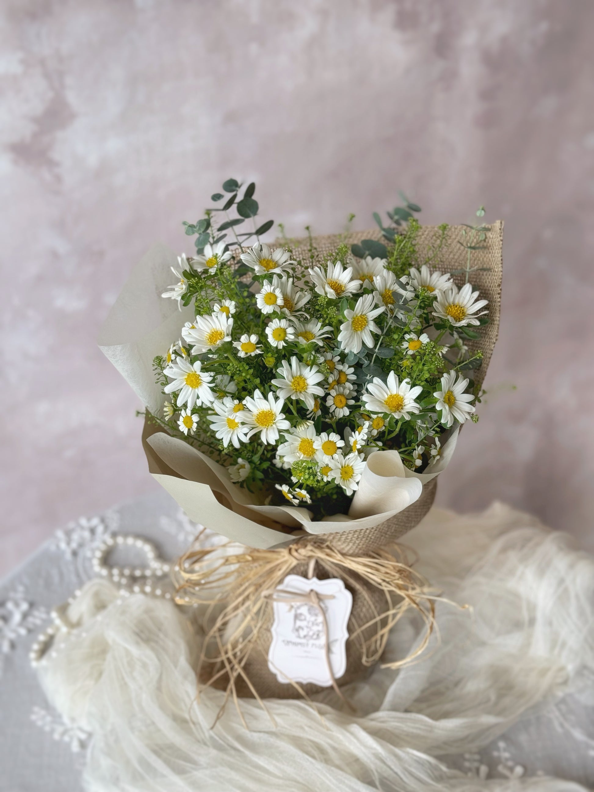 Daisy farm_fresh_flowers_handtied_bouquet on the table