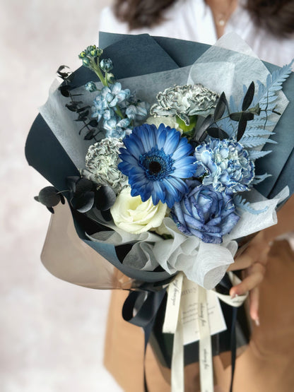 Deep diver dyed fresh flowers handtied bouquet close up view