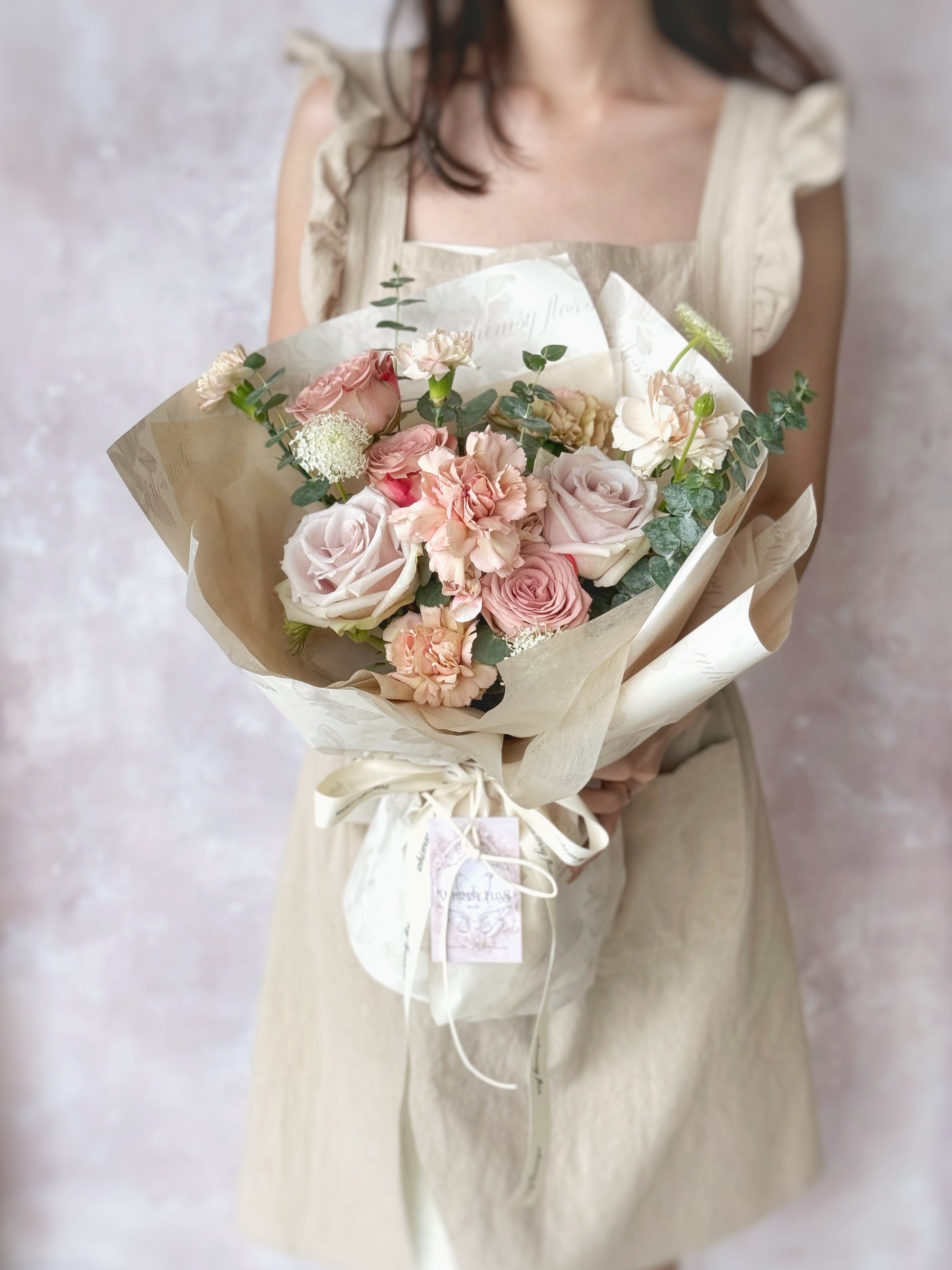 Hush of blush mix fresh flowers handtied bouquet holding the grand size bouquet