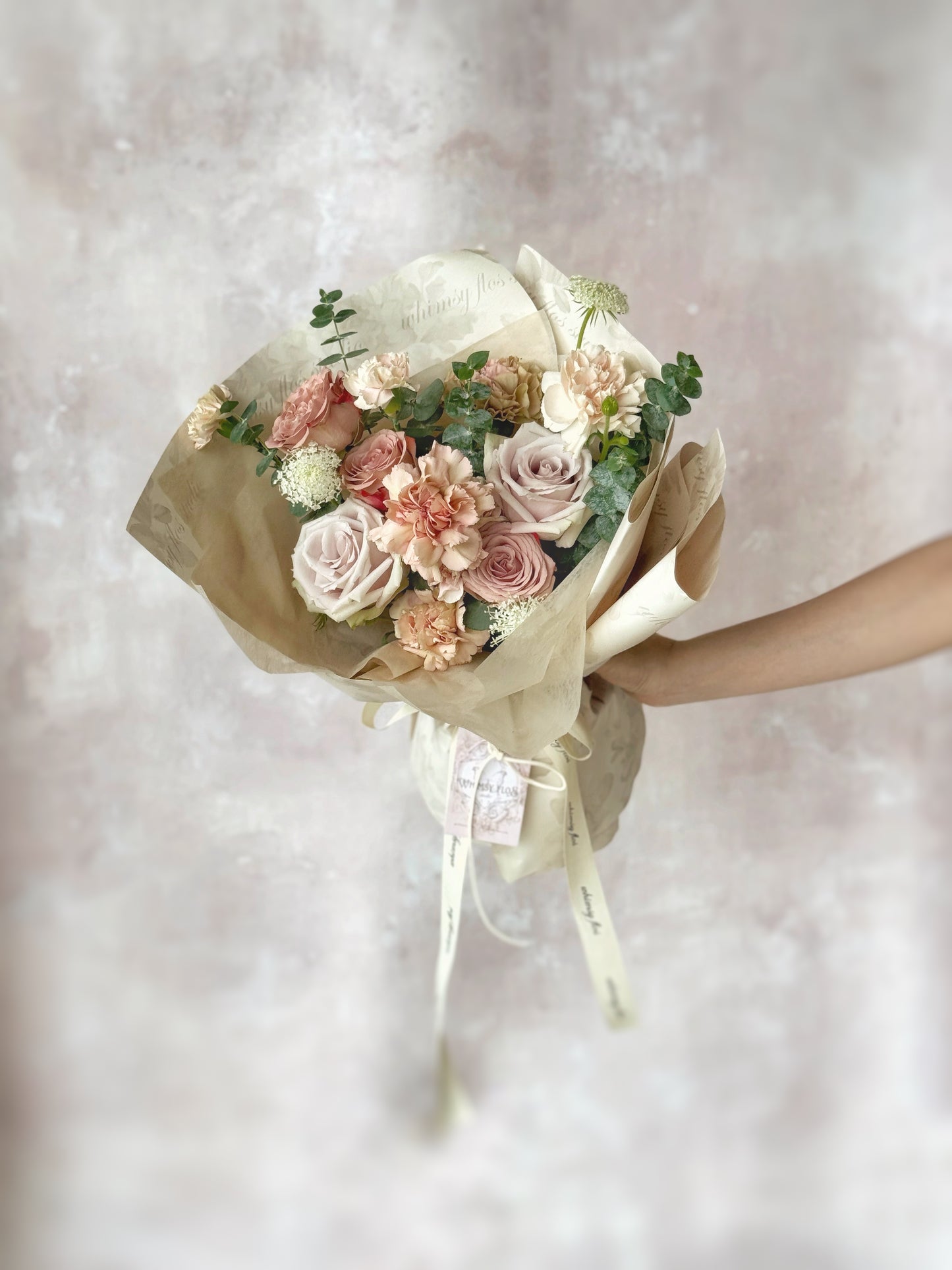 Hush of blush mix fresh flowers handtied bouquet front view