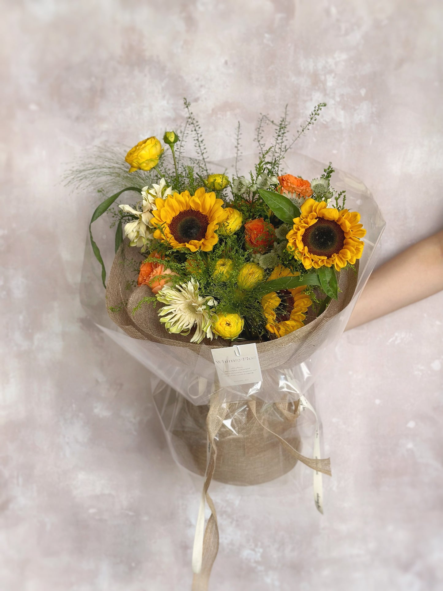 Lush cottage style sunflowers and roses mixed bouquet 