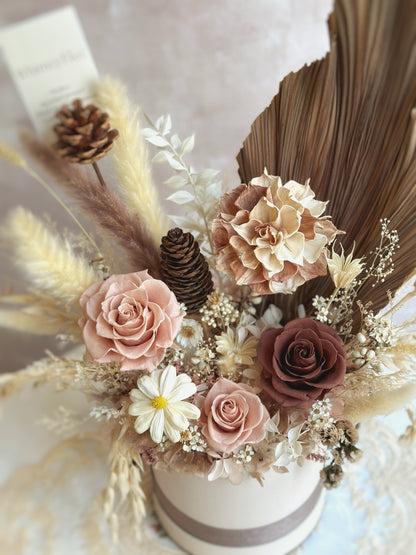 Close up view of earthy tone preserved flowers bloom box