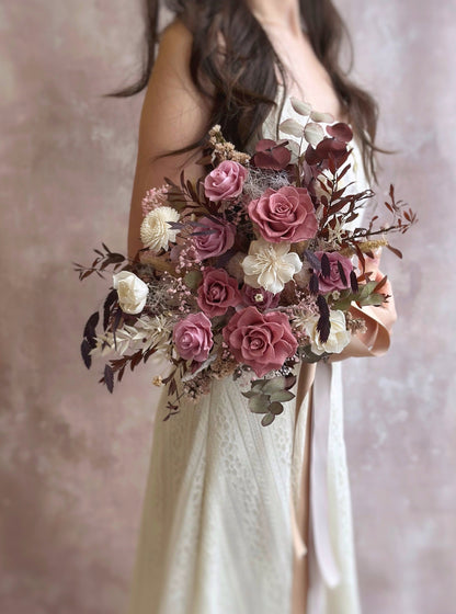 Pink mauve preserved roses bridal bouquet in front view