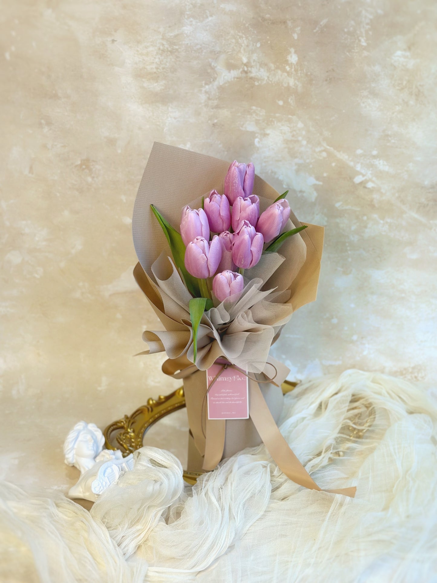 Elegant lilac tulips fresh flowers bouquet 