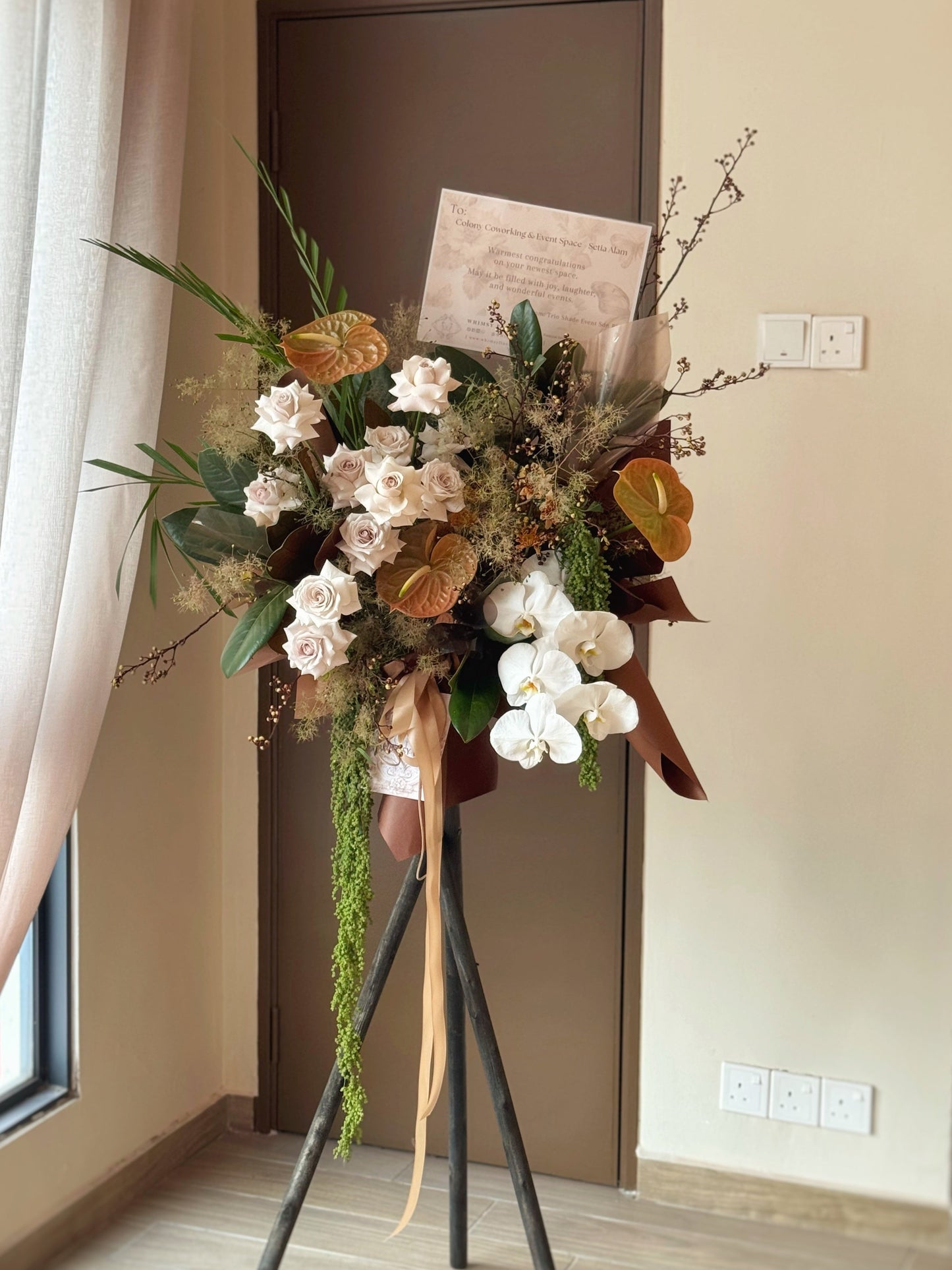 Artistic fresh flowers grand opening flower in muted earthy tone. Modern and contemporary design for grand opening celebration.
