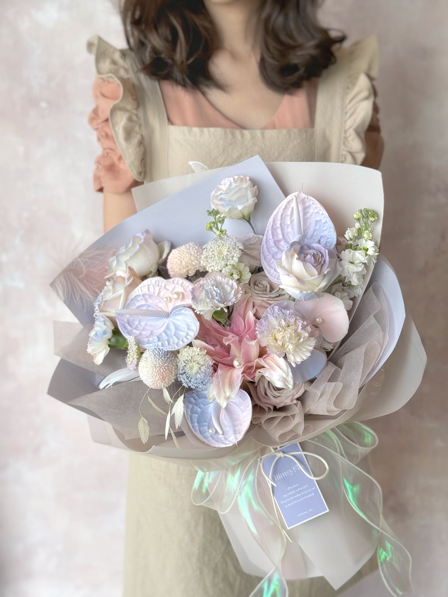 Colette_fresh_flowers_fluffy_cloud_handtied_bouquet_holding by model