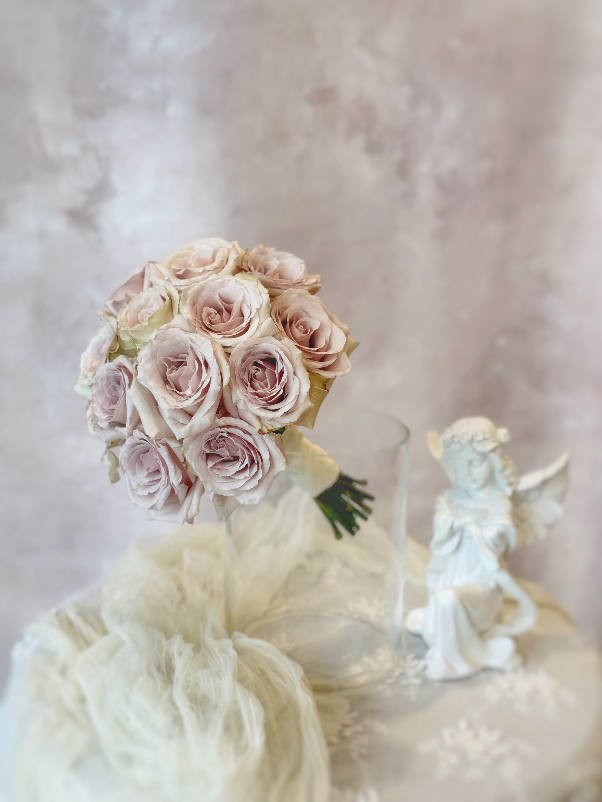 Only quicksand roses round shaped bridal_bouquet_side view, a round bouquet of premium quicksand roses, designed for brides seeking a classic and elegant touch.
