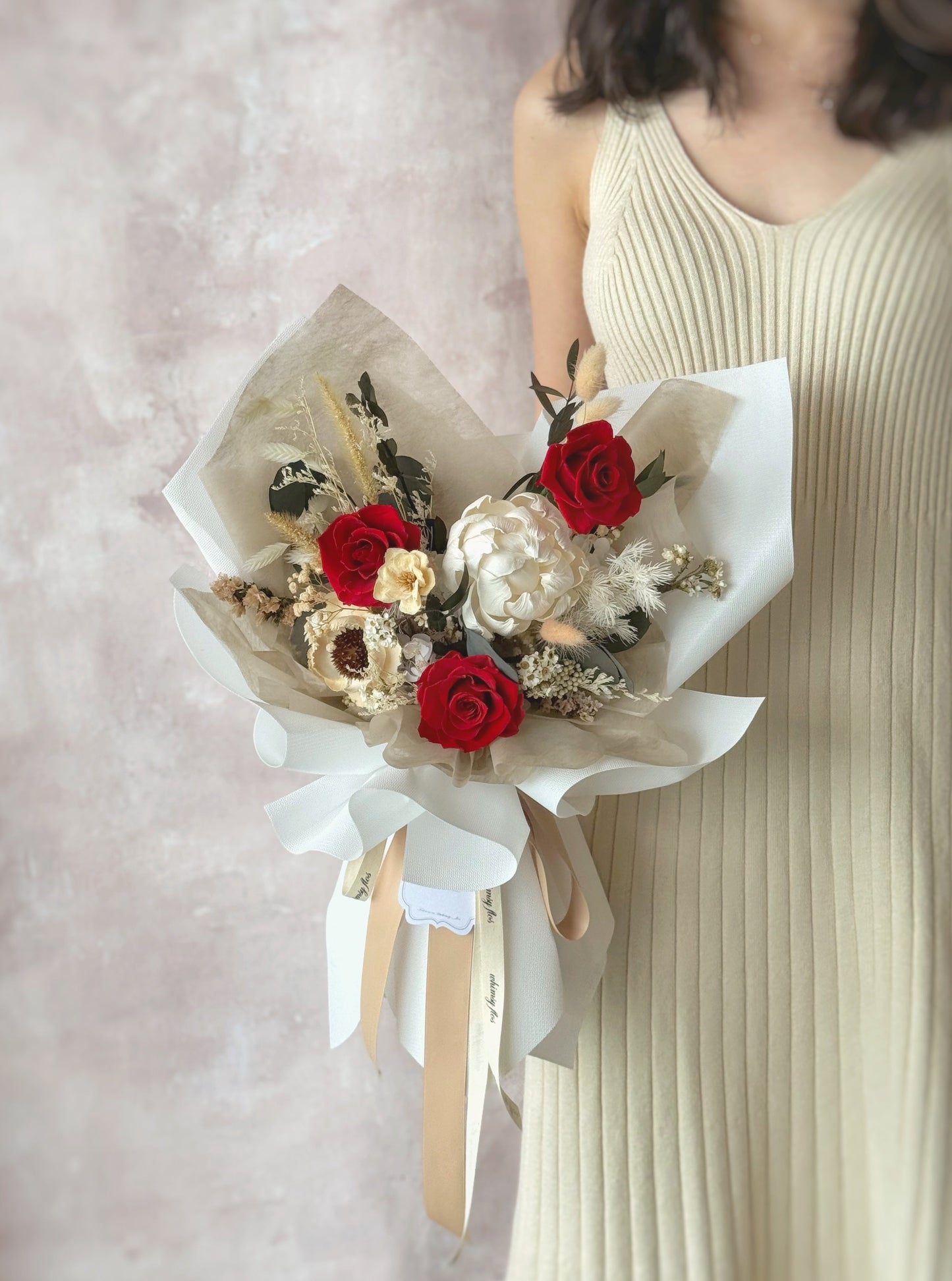 Promise preserved flowers bouquet grand size bouquet holding by a model