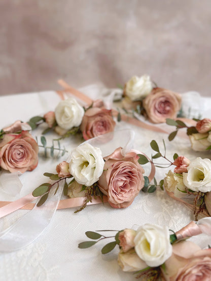 Close up view of rose douce fresh cappuccino rose wrist corsages in bulk for wedding and other occasions  