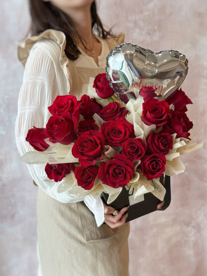 Red kenyan roses bloom box with personalized silver heart shaped balloon front view