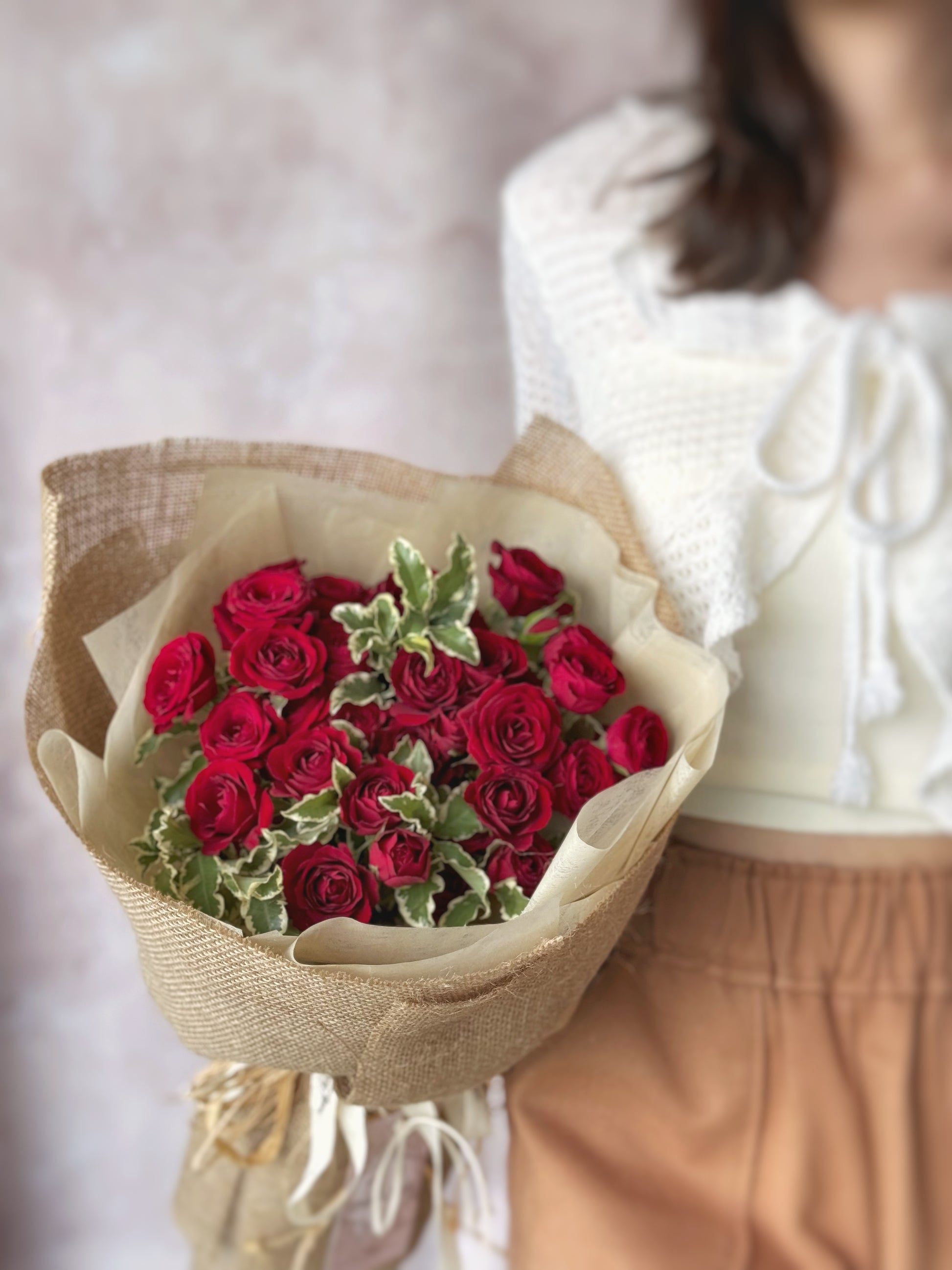 Rosetta red spray roses fresh flowers handtied bouquet front view