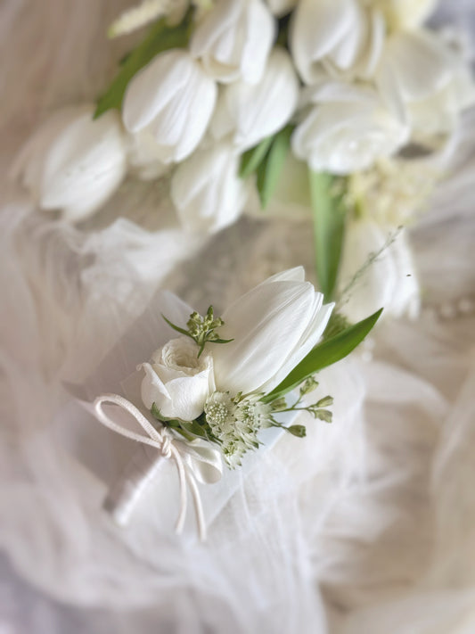 Close up view of Sage white tulip wedding corsage, its clean look and elegant is perfect for weddings, proms, and formal occasions