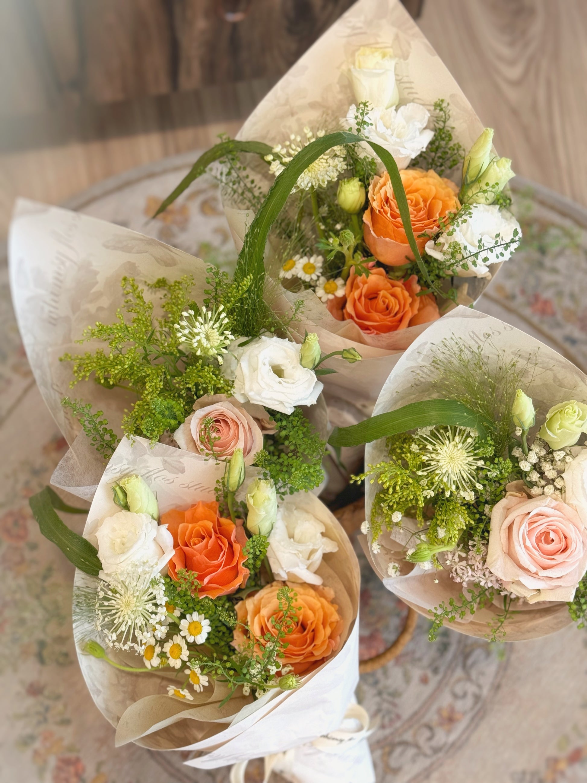 Weekly flowers fresh flowers small bouquet orange roses mix top view