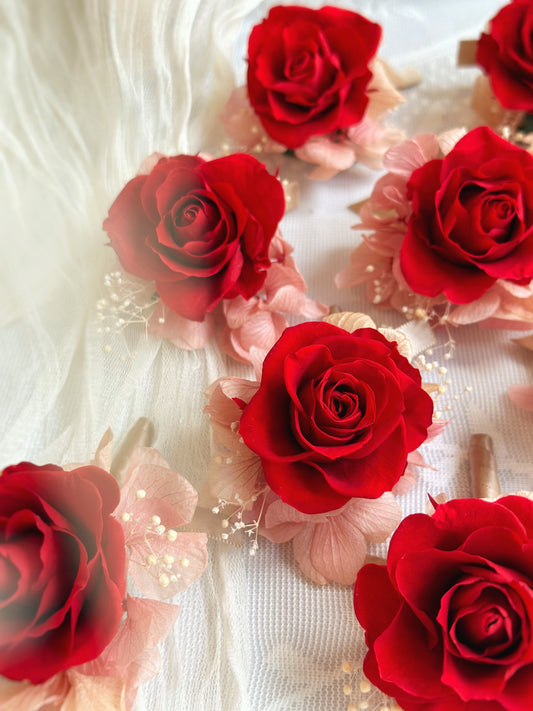 close up view of poppy red preserved rose corsage, bulk order for oriental red wedding theme